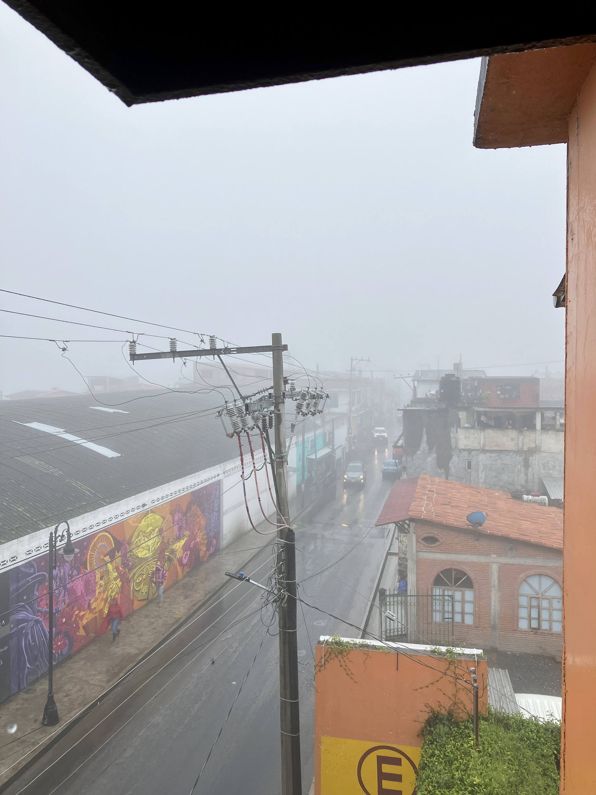 Tlatlauqitepec, Puebla in a misty autumn morning.