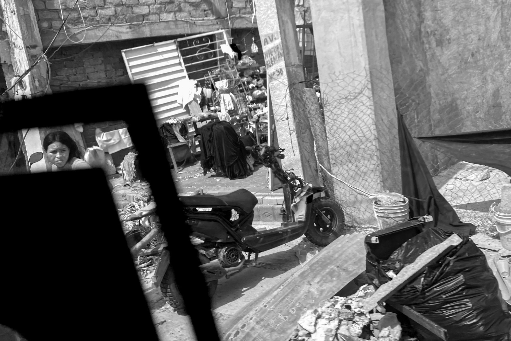A girl watching at the debris in one of the destroyed streets after the hurricane otis smashed acapulco.