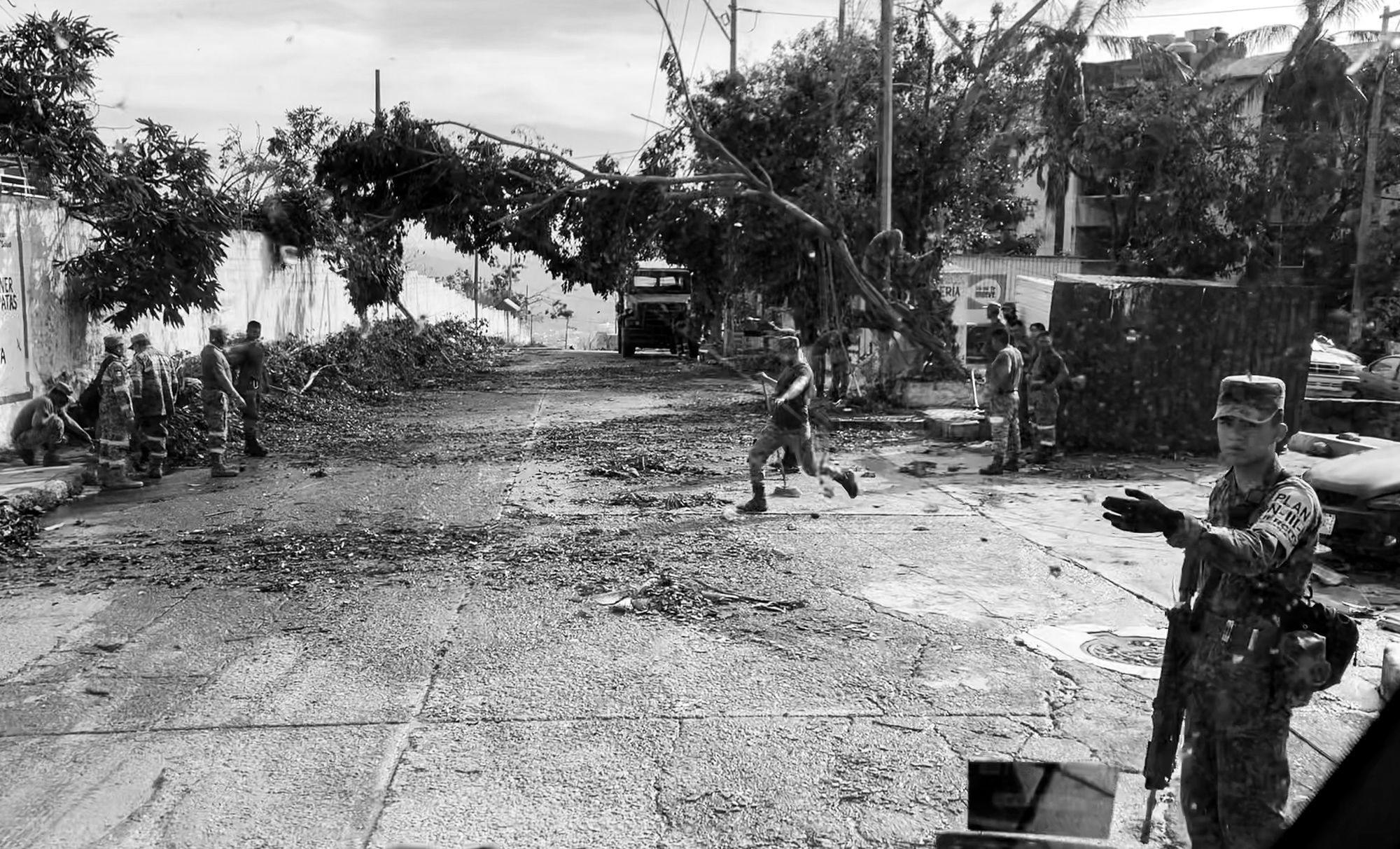 marina is cleaning the debris after hurricane otis in an acapulco district coloso