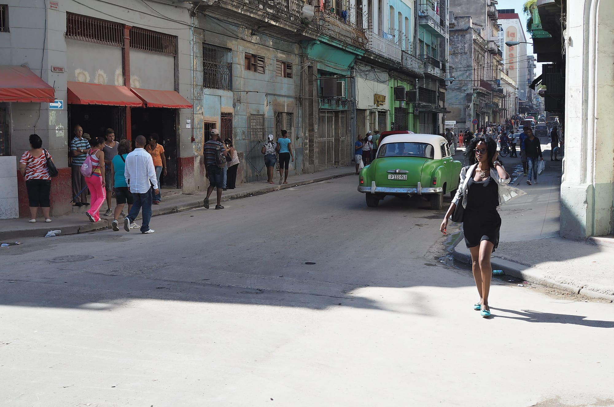 cuban woman walking by the street in old havana