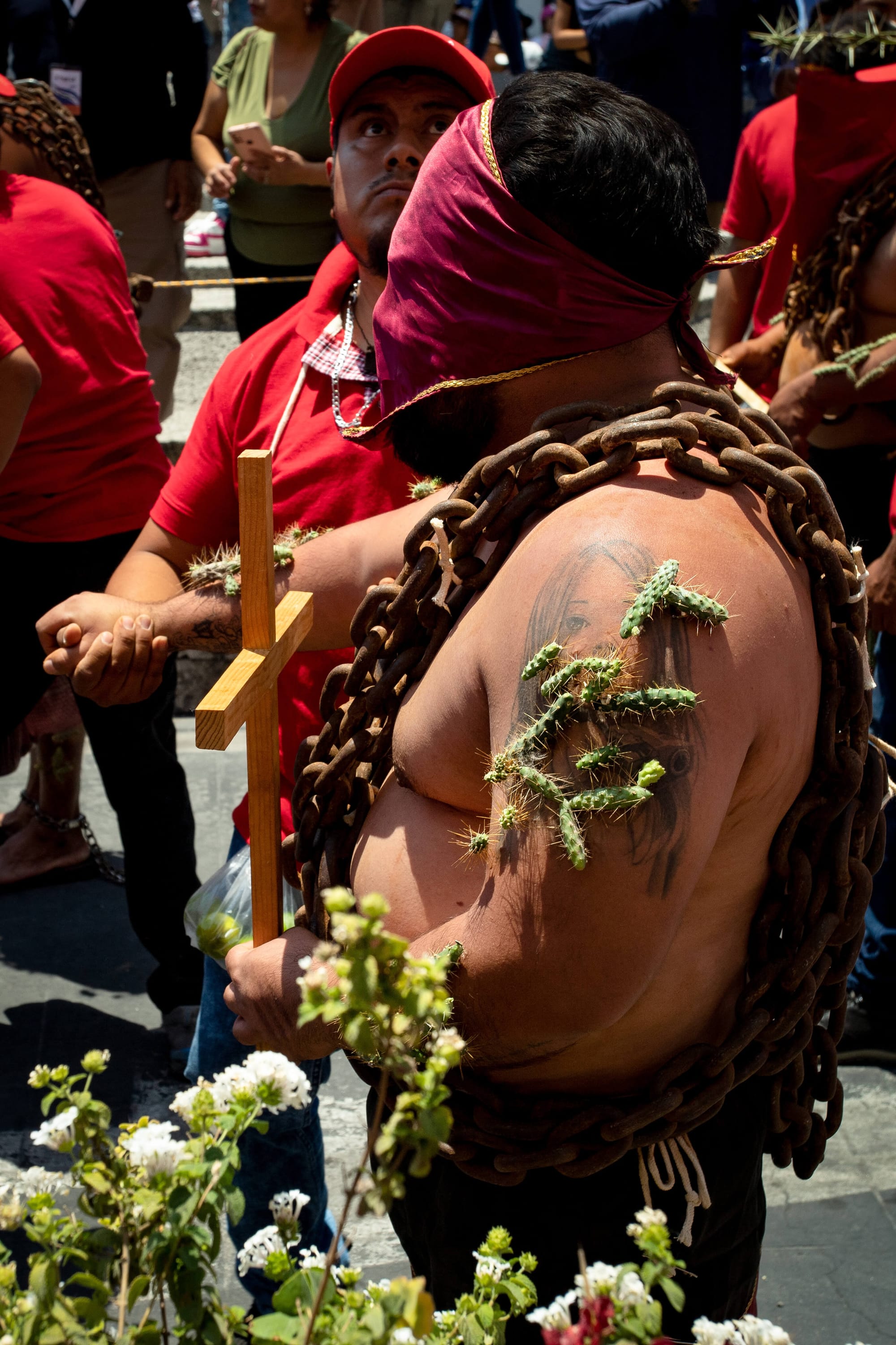 Los Engrillados of Atlixco: Mexican men in shackles with cacti stuck in their skin walk in pain to wash away their sins