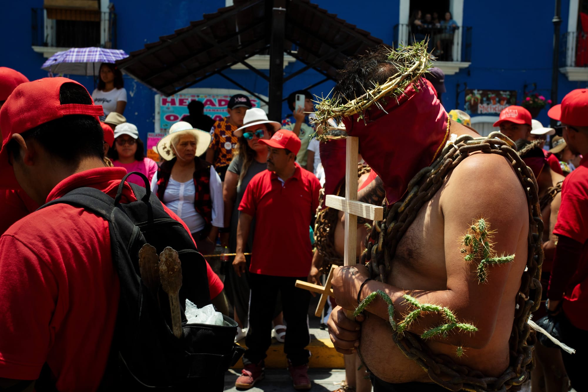 Los Engrillados of Atlixco: Mexican men in shackles with cacti stuck in their skin walk in pain to wash away their sins