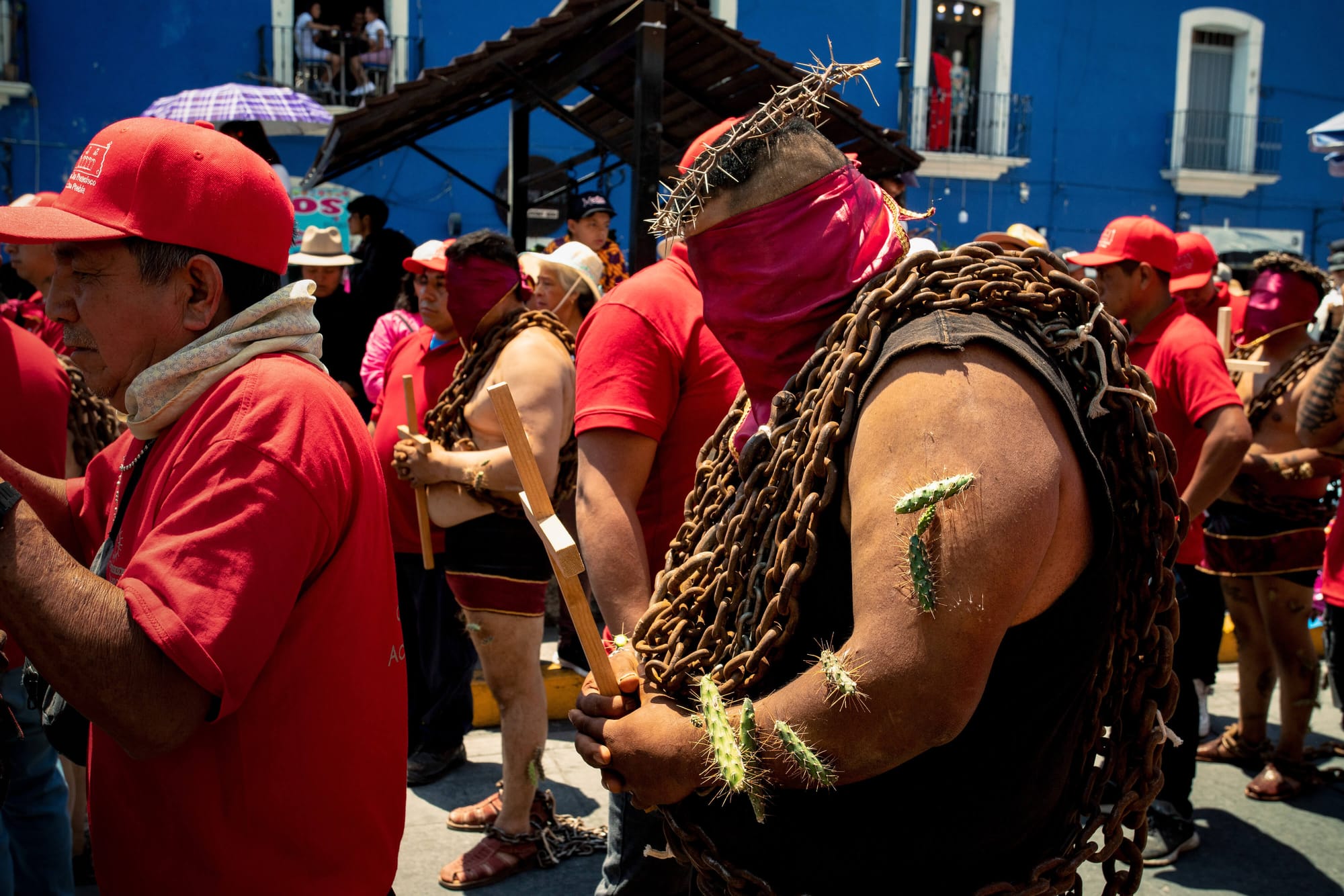 Los Engrillados of Atlixco: Mexican men in shackles with cacti stuck in their skin walk in pain to wash away their sins